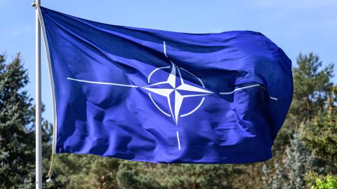 A NATO flag flies on April 30, 2024. (Photo by Robert Michael/picture alliance via Getty Images)
