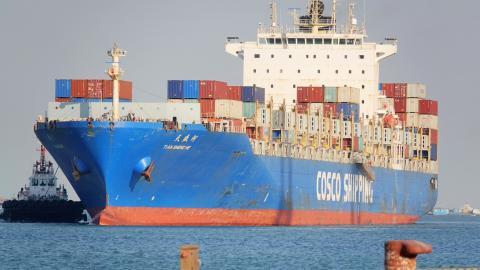 A Cosco Shipping container ship prepares to dock at Yantai, China