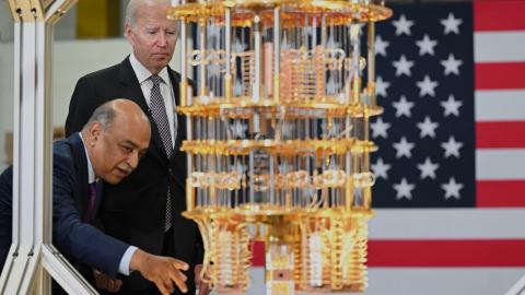 Joe Biden looks at a quantum computer with IBM CEO Arvind Krishna as he tours the IBM facility in Poughkeepsie, New York, on October 6, 2022. (Mandel Ngan/AFP via Getty Images)