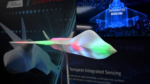 A model of the proposed jet fighter aircraft Tempest, a joint program by a consortium known as "Team Tempest," which includes Britain and Japan, is pictured in the BAE hall during the in Farnborough, United Kingdom, on July 18, 2022. (Justin Tallis/AFP via Getty Images)