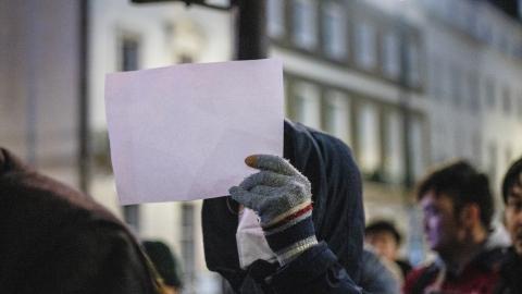 An A4 paper was seen held by a protester during the demonstration outside the Chinese embassy in London on December 5, 2022. (Hesther Ng/SOPA Images/LightRocket via Getty Images)