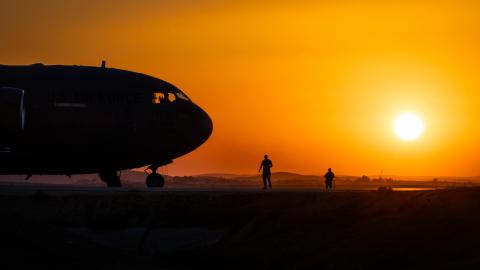United States Air Force Airmen assigned to Ramstein Air Base in Germany guard a C-17 Globemaster III at Nevatim Base, Israel, on October 15, 2023. (Edgar Grimaldo via DVIDS)