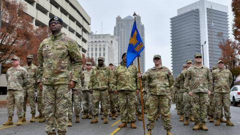 Members of the 117th Air Refueling Wing march in the National Veterans Day Parade in Birmingham, Alabama, on November 11, 2023. (US Air National Guard photo by Senior Master Sgt. Jeremy Farson)