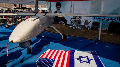 Missiles and UAVs are shown with Israeli and American flags in Tehran, Iran, on February 11, 2024. (Photo by Hossein Beris/Middle East Images/AFP via Getty Images)