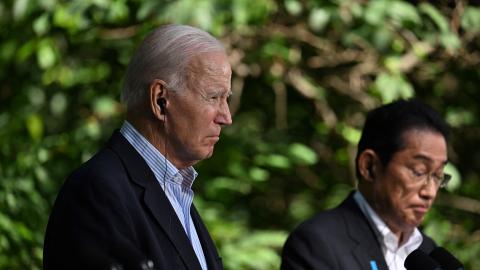 President Joe Biden listens to Japanese Prime Minister Fumio Kishida during a press conference at the Camp David Trilateral Summit in Maryland on August 18, 2023. (Photo by Jim Watson/AFP via Getty Images)