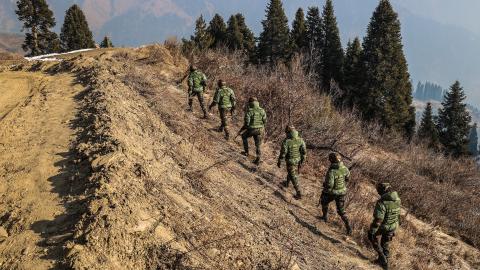 Indian soldiers patrol the line of control between Pakistan and India on January 24, 2024. (Nasir Kachroo via Getty Images)