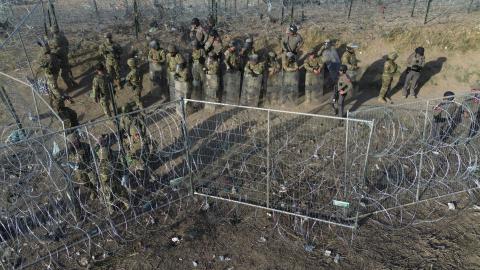US Border guards deter illegal migrants as they try to cut the razor wire fences put up by the Texas National Guard in Ciudad Juarez, Mexico, on March 22, 2024. (Christian Torres via Getty Images)
