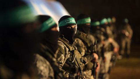 Hamas fighters take part in a gathering on January 31, 2016, in Gaza city to pay tribute to their fellow militants who died after a tunnel collapsed in the Gaza Strip. (Mahmud Hams via Getty Images)