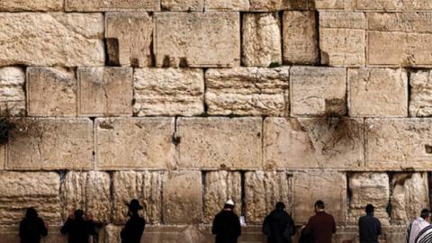 Jewish men pray at the Western Wall in Jerusalem's Old City on January 25, 2022. (Getty Images)