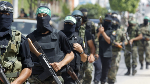 Palestinian militants of the Ezzedine al-Qassam Brigades, Hamas's armed wing, parade in Rafah, southern Gaza Strip, on May 29, 2014. (SAID KHATIB/AFP/Getty Images)