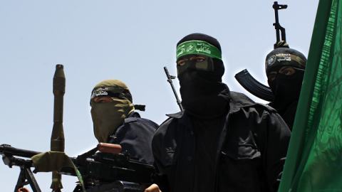 Palestinian militants of the Ezzedine al-Qassam Brigades, Hamas' armed wing, in the central Gaza Strip on June 30, 2014. (SAID KHATIB/AFP/Getty Images)