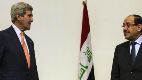 Iraqi Prime Minister Nuri al-Maliki (R) and US Secretary of State John Kerry meet at the Prime Minister's Office in Baghdad on June 23, 2014. (BRENDAN SMIALOWSKI/AFP/Getty Images)