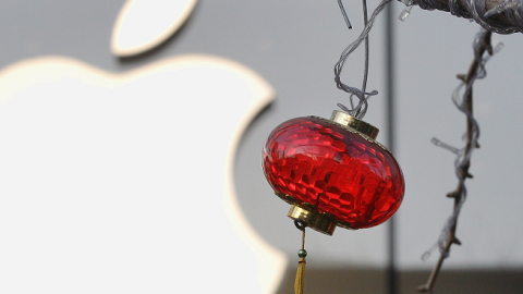 A red lantern lamp is seen in front of the Apple's Beijing flagship store on January 13, 2012 in Beijing, China. (Feng Li/Getty Images)