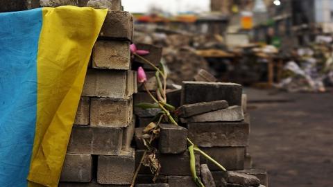 The Ukrainian flag on top of bricks used for barricades in Maidan Square, on March 19, 2014 in Kiev, Ukraine. (Spencer Platt/Getty Images)