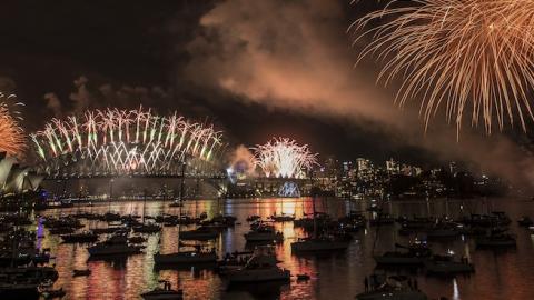 Fireworks explode over the Sydney Harbour Bridge and the Sydney Opera House on New Year's Eve on Sydney Harbour on January 1, 2017 in Sydney, Australia. (Brett Hemmings\City of Sydney/Getty Images)