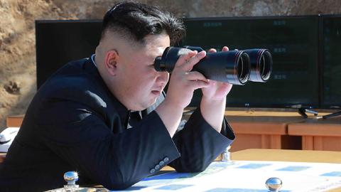 North Korean leader Kim Jong-Un inspecting the test-fire of intercontinental ballistic missile Hwasong-14, July 4, 2017 (STR/AFP/Getty Images)
