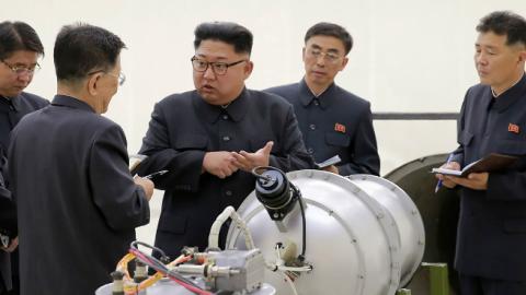 North Korean leader Kim Jong-Un touring unknown North Korean facility, September 3, 2017 (STR/AFP/Getty Images)