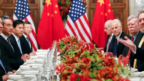 President Trump, pictured in trade talks on Dec. 1 in Buenos Aires with Chinese President Xi Jinping (far left), this week dangled the possibility that an arrested Huawei executive could become a bargaining chip. PHOTO: KEVIN LAMARQUE/REUTERS
