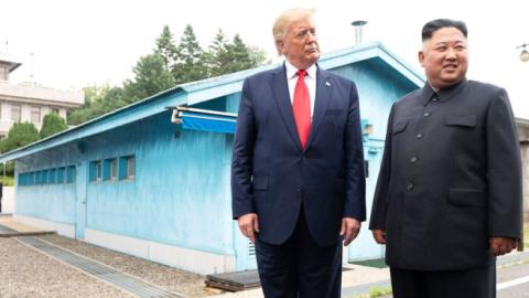 President Donald Trump and North Korean leader Kim Jong-un speak with reporters at the Korean Demilitarized Zone at Panmunjom, June 30, 2019. (White House)