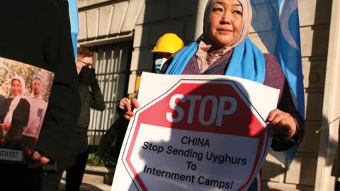 Demonstrators protest China’s genocidal campaign against the Uyghur people outside the Chinese Embassy in London, England, on January 19, 2020. (David Cliff/NurPhoto via Getty Images)
