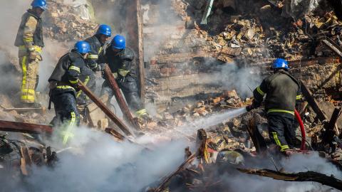 KYIV, UKRAINE - 2022/10/17: Ukrainian rescuers work at the site of a residential building destroyed by a Russian drone strike, which local authorities consider to be Iranian-made unmanned aerial vehicles (UAVs) Shahed-136, in central Kyiv. At least four people have been killed as a result of a drone attack on a residential building in Kyiv. (Photo by Oleksii Chumachenko/SOPA Images/LightRocket via Getty Images)
