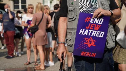 A banner reading "#End Jew Hatred" at a rally in Berlin, Germany, on July 25, 2021. (Jörg Carstensen/picture alliance via Getty Images) antisemitism