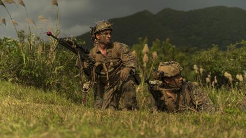 U.S. Marines with 1st Battalion, 2nd Marines conduct a platoon attack during Stand-in Force Exercise on Okinawa, Japan, Dec.11, 2022. SiF-EX is a Division-level exercise involving all elements of the Marine Air-Ground Task Force focused on strengthening multi-domain awareness, maneuver, and fires across a distributed maritime environment. This exercise serves as a rehearsal for rapidly projecting combat power in defense of allies and partners in the region. (U.S. Marine Corps photo by Sgt. Mario A. Ramirez)