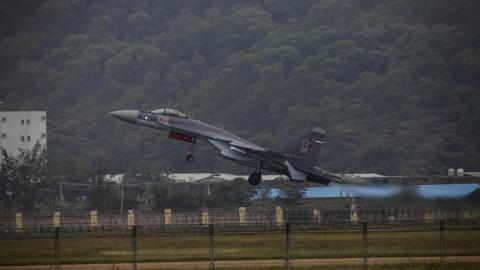 ZHUHAI, CHINA - NOVEMBER 10: Russian Sukhoi SU-35 performs at the Airshow China 2014 in Zhuhai, Guangdong province, November 10, 2014. Airshow China is the only international aerospace trade show in China that is endorsed by the Chinese central g