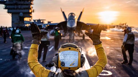 An F/A-18E Super Hornet from the “Mighty Shrikes” of Strike Fighter Squadron (VFA) 94 prepares to launch from the aircraft carrier USS Nimitz (CVN 68). Nimitz is in U.S. 7th Fleet conducting routine operations. 7th Fleet is the U.S. Navy's largest forward-deployed numbered fleet, and routinely interacts and operates with Allies and partners in preserving a free and open Indo-Pacific region. (U.S. Navy photo by Mass Communication Specialist 2nd Class David Rowe)