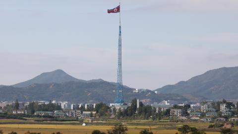 A North Korean flag in North Korea's propaganda village of Gijungdong is seen from a South Korea's observation post inside the demilitarized zone (DMZ) on October 4, 2022. (Chung Sung-Jun/Getty Images)