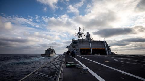 SOUTH CHINA SEA (Feb. 19, 2022) – The Independence-variant littoral combat ship USS Tulsa (LCS 16) approaches the dry cargo ship USNS Amelia Earhart (T-AKE 6) for a replenishment-at-sea. Tulsa, part of Destroyer Squadron (DESRON) 7, is on a rotational deployment, operating in the U.S. 7th Fleet area of operations to enhance interoperability with partners and serve as a ready-response force in support of a free and open Indo-Pacific region. (U.S. Navy photo by Mass Communication Specialist 1st Class Devin M.
