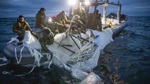 Sailors assigned to Explosive Ordnance Disposal Group 2 recover a high-altitude surveillance balloon off the coast of Myrtle Beach, South Carolina, Feb. 5, 2023. EODGRU 2 is a critical part of the Navy Expeditionary Combat Force that clears explosive hazards to provide access to denied areas; secures the undersea domain for freedom of movement; builds and fosters relationships with trusted partners, and protects the homeland. At the direction of the President of the United States and with the full support o