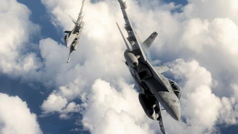 wo U.S. Navy EA-18G Growler aircraft attached to the Electronic Attack Squadron (VAQ) 138 "Yellowjackets", assigned to Carrier Task Force 70, break away from a KC-135 Stratotanker assigned to the 506th Expeditionary Air Refueling Squadron over the Pacific Ocean while flying in support of Exercise Valiant Shield 22 (VS22), June 13 2022. Exercises like VS22 allow forces across the Indo-Pacific the opportunity to integrate Navy, Marine Corps, Army, Air Force, and Space Force to train in precise, lethal, and ov