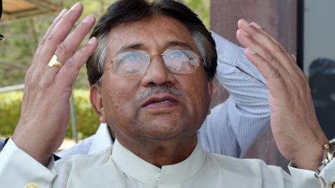 Former President of Pakistan Pervez Musharraf praying at Karachi International Airport, in Karachi, Pakistan, on March 24, 2013. (Aamir Qureshi/AFP via Getty Images)