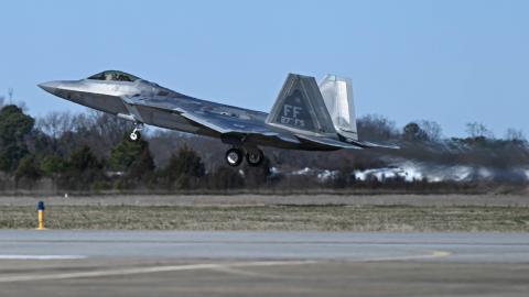 A U.S. Air Force pilot takes off in an F-22 Raptor at Joint Base Langley-Eustis, Virginia, Feb. 4, 2023. Active duty, Reserve, National Guard, and civilian personnel planned and executed the operation, and partners from the U.S. Coast Guard, Federal Aviation Administration, and Federal Bureau of Investigation ensured public safety throughout the operation and recovery efforts. (U.S. Air Force photo by Airman 1st Class Mikaela Smith)