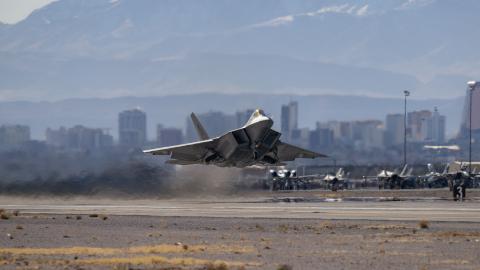 An F-22 Raptor assigned to the 94th Fighter Squadron, Joint Base Langley-Eustis, Virginia, takes off for a Red Flag 23-1 mission at Nellis Air Force Base, Nevada, Jan. 24, 2023.