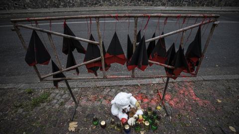 Paper planes hang in front of the Iranian Embassy during a protest against Iran's supply of drones to Russia in Kyiv, Ukraine, on October 18, 2022. (Metin Aktas/Anadolu Agency via Getty Images)