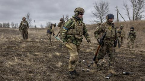 Members of the Ukrainian Volunteer Army prepare to fire a rocket propelled grenade while testing weapons systems on February 25, 2023, in Donbas, Ukraine. (John Moore/Getty Images)