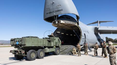 U.S. Marines with 5th Battalion, 11th Marine Regiment, 1st Marine Division, drive an M142 High Mobility Artillery Rocket System onto a U.S. Air Force C-5 Galaxy during a loading exercise at Marine Corps Air Station Camp Pendleton, California, Feb. 7, 2023. Marines with the battalion conducted the exercise in order to rehearse the planning and execution of embarking a self-sustaining platoon on a C-5. (U.S. Marine Corps photo by Cpl. Cameron Hermanet)