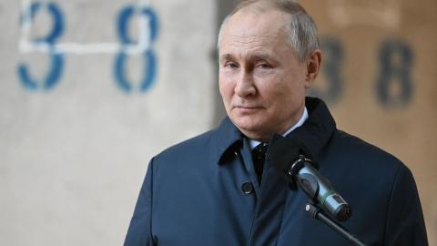 Russian President Vladimir Putin visits the National Space Centre construction site in Moscow on February 27, 2022. (Photo by Sergei Guneyev / Sputnik/ AFP