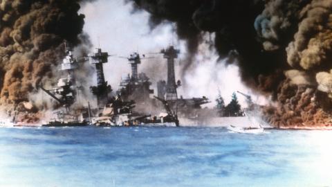 Thick smoke billows up from stricken American warships (from left, USS West Virginia and USS Tennessee) along battleship row during the Japanese attack on Pearl Harbor, Honolulu, Oahu, Hawaii, December 7, 1941. (Photo by US Navy/Interim Archives/Getty Images)