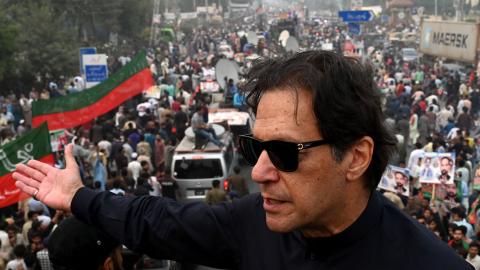 Pakistan's former prime minister Imran Khan speaks while taking part in an anti-government march in Gujranwala, Pakistan, on November 1, 2022, two days before he was shot in the foot at another rally. (Arif Ali/AFP via Getty Images)
