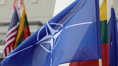 The NATO and Lithuanian flags fly in Vilnius, Lithuania, on July 9, 2023. (Petras Malukas/AFP via Getty Images)