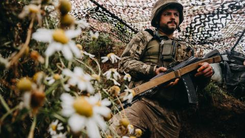 A Ukrainian soldier of the 24th Separate Mechanized Brigade stands outside the town of New York on the front lines of Russia's war against Ukraine on July 28, 2023. (Wojciech Grzedzinski/Anadolu Agency via Getty Images)