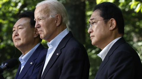South Korean President Yoon Suk-yeol, US President Joe Biden, and Japanese Prime Minister Fumio Kishida hold a joint news conference following trilateral talks on August 18, 2023, in Camp David, Maryland. (Chip Somodevilla/Getty Images)