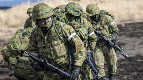 Japan Ground Self-Defense Force paratroopers assigned to the 1st Airborne Brigade move to follow-on locations after landing at JGSDF East Fuji Maneuver Area, Japan, Jan. 31, 2023, (U.S. Air Force photo by Yasuo Osakabe)