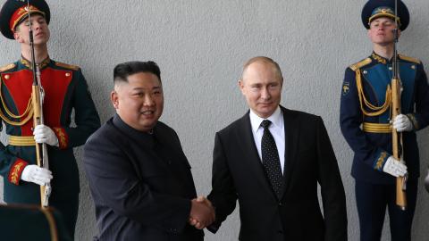 Russian President Vladimir Putin greets North Korean Leader Kim Jong-un before a meeting April 25, 2019, in Vladivostok, Russia. (Mikhail Svetlov via Getty Images)