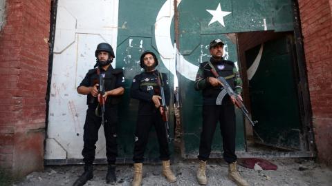 Security forces take a measure in front of a damaged police compound after a suicide bombing attack in Bara, Khyber Pakhtunkhwa, Pakistan, on July 20, 2023. (Hussain Ali/Anadolu Agency via Getty Images)