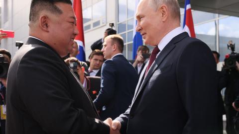 Russia's President Vladimir Putin shakes hands with North Korea's leader Kim Jong Un during their meeting at the Vostochny Cosmodrome in Amur Oblast, Russia, on September 13, 2023. (Mikhail Metzel via Getty Images)