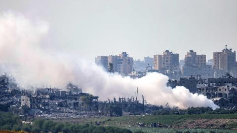 The Gaza Strip in southern Israel shows smoke plumes billowing during Israeli bombardment on October 31, 2023. (Menahem Kahama/AFP via Getty Images)